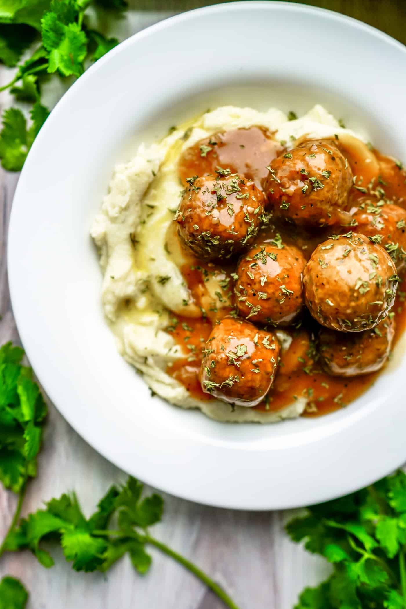 Calling all gravy lovers!  This Instant Pot Meatballs and Gravy recipe with cauliflower mash is a new Instant Pot must-try dish! It is low carb, vegan and keto friendly meatballs and gravy recipe. And, perfectly pared with cauliflower mash. Try them today and let us know your thoughts!