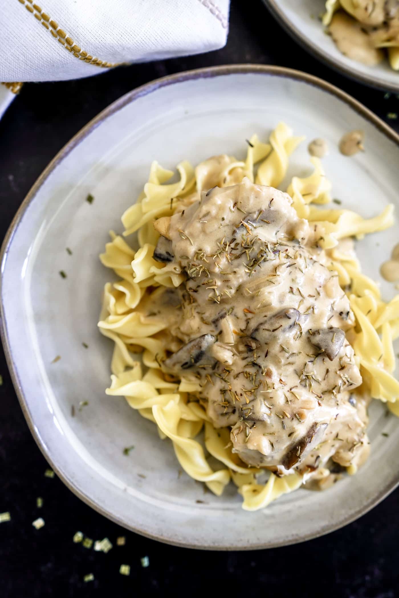 Chicken Stroganoff made in the Instant Pot with mushrooms over egg noodles