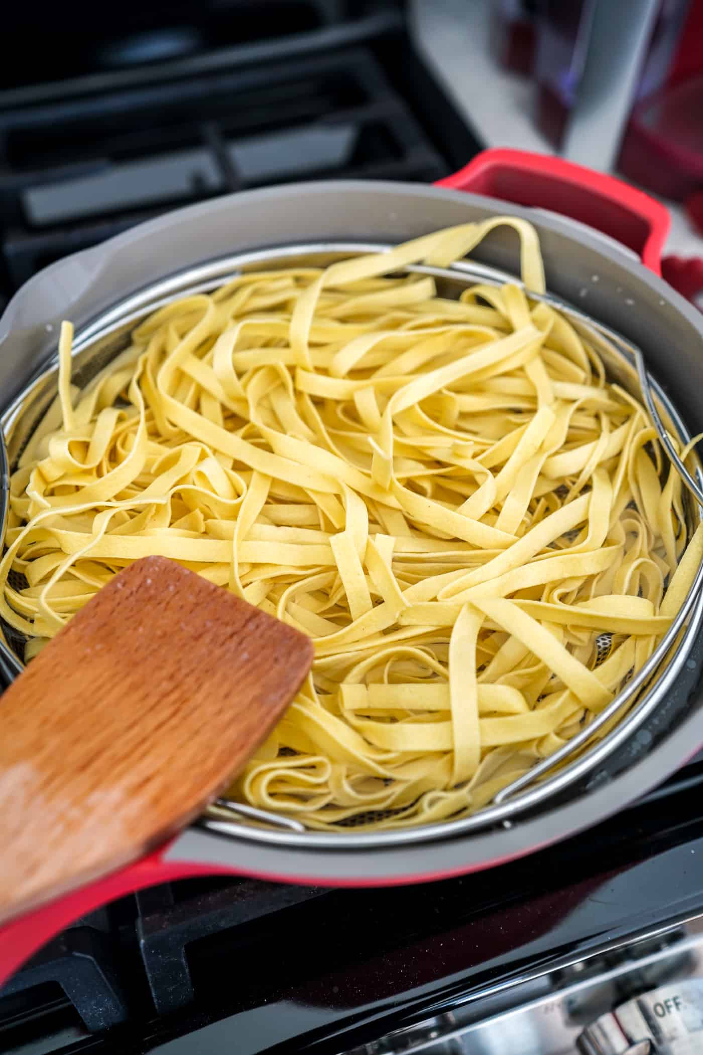 Fresh fettuccini pasta in an Our Place Always Pan