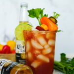Large mason jar filled with a Mexican Michelada recipe