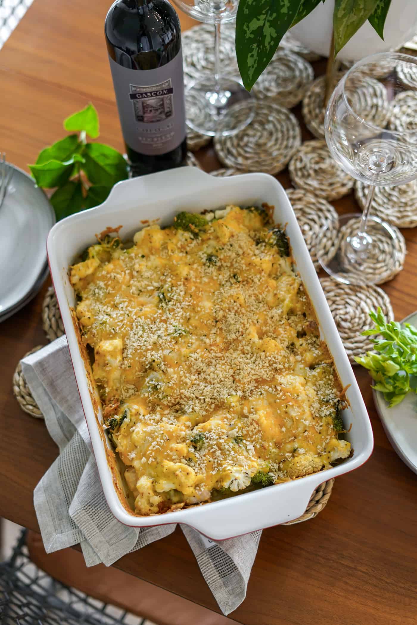 A large casserole dish filled with broccoli chicken casserole recipe on a dining table